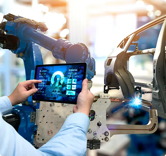 Software development in handheld tablet to monitor a robotic manufacturing arm in a factory setting.